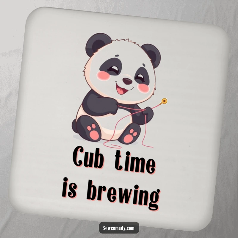 Funny panda coasters with a smiling cub holding needle and thread, protecting surfaces.